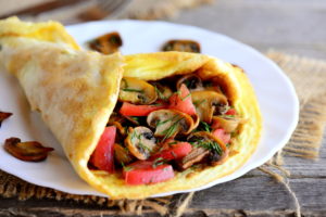 omelette with mushrooms and tomatoes